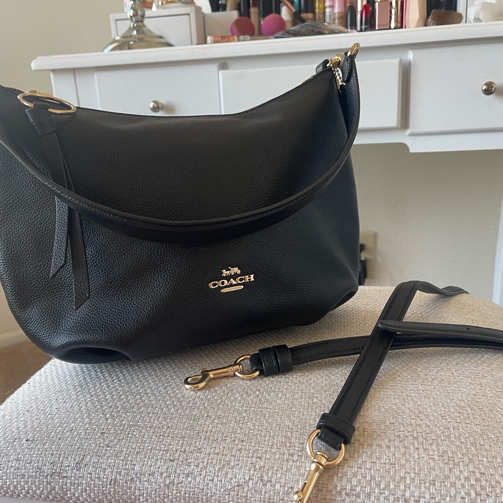 Coach black leather shoulder bag with straps